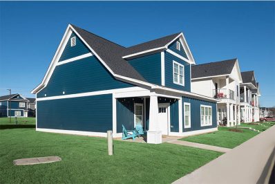 Deep clue cottage with light blue outdoor seating