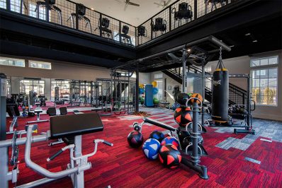 Medicine balls and weight benches in fitness center