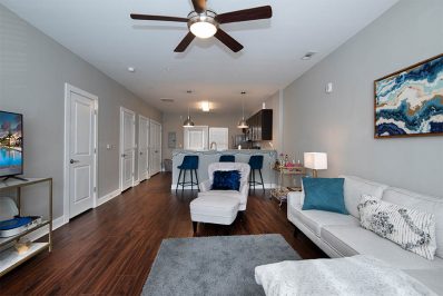 Open layout living room with white sofa