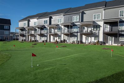 Green area surrounded by apartment buildings