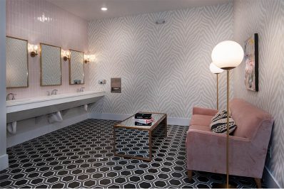 public bathroom with black flooring
