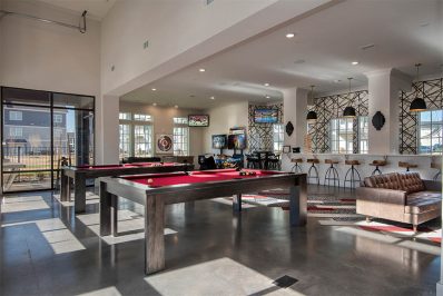 Red pool tables in game room