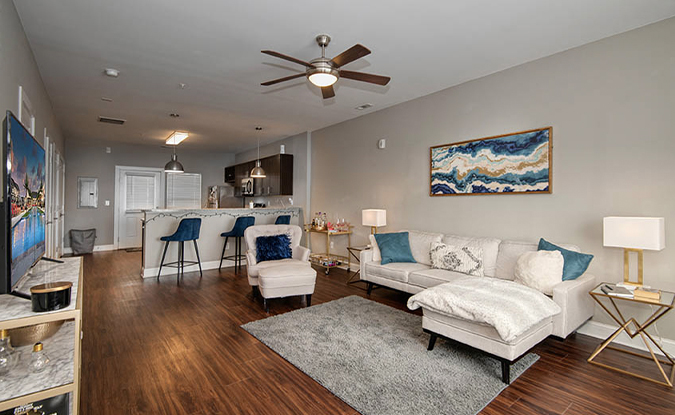 Open layout living room looking towards kitchen