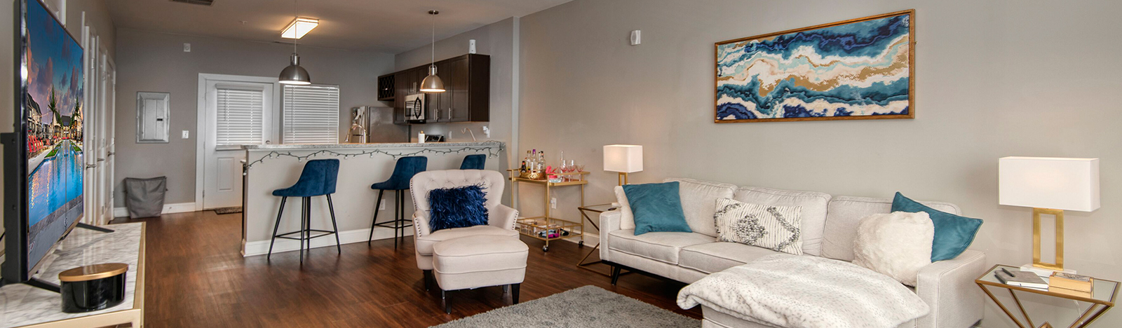 Furnished apartment featuring an open floor plan